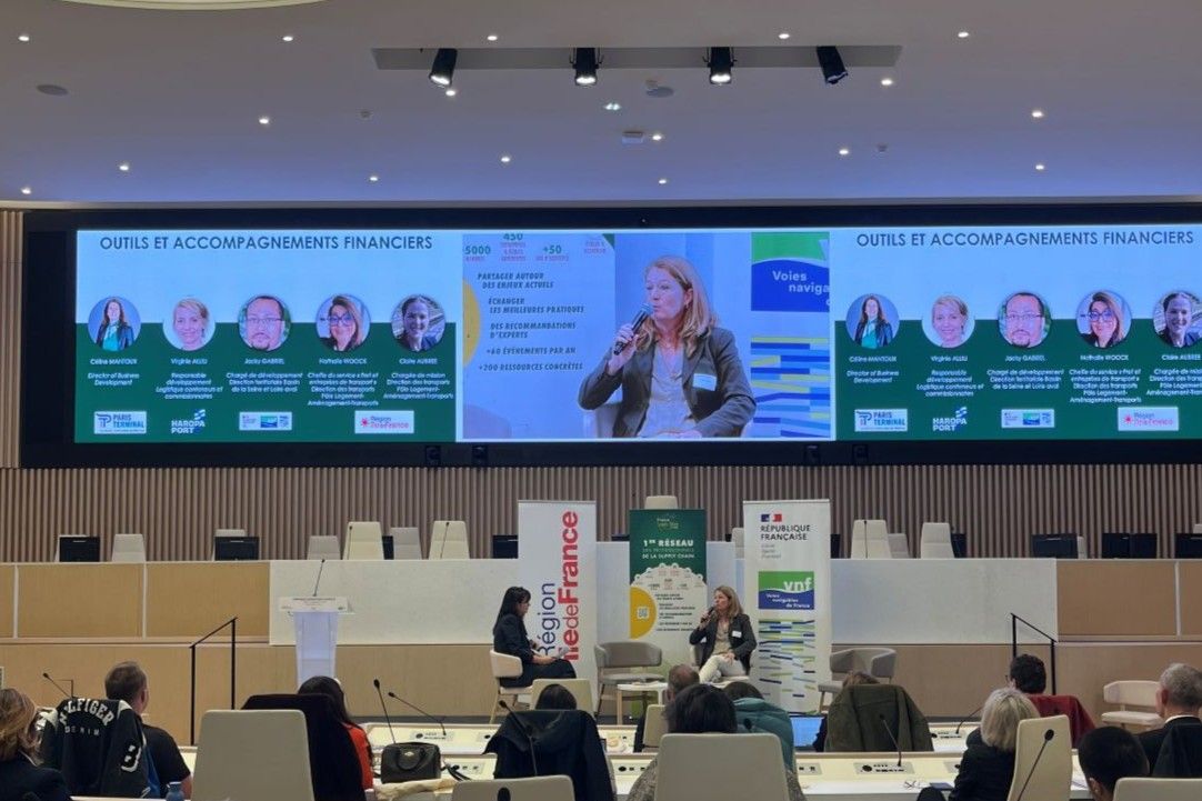 speaker at the microphone in the chamber during the morning session dedicated to river transport